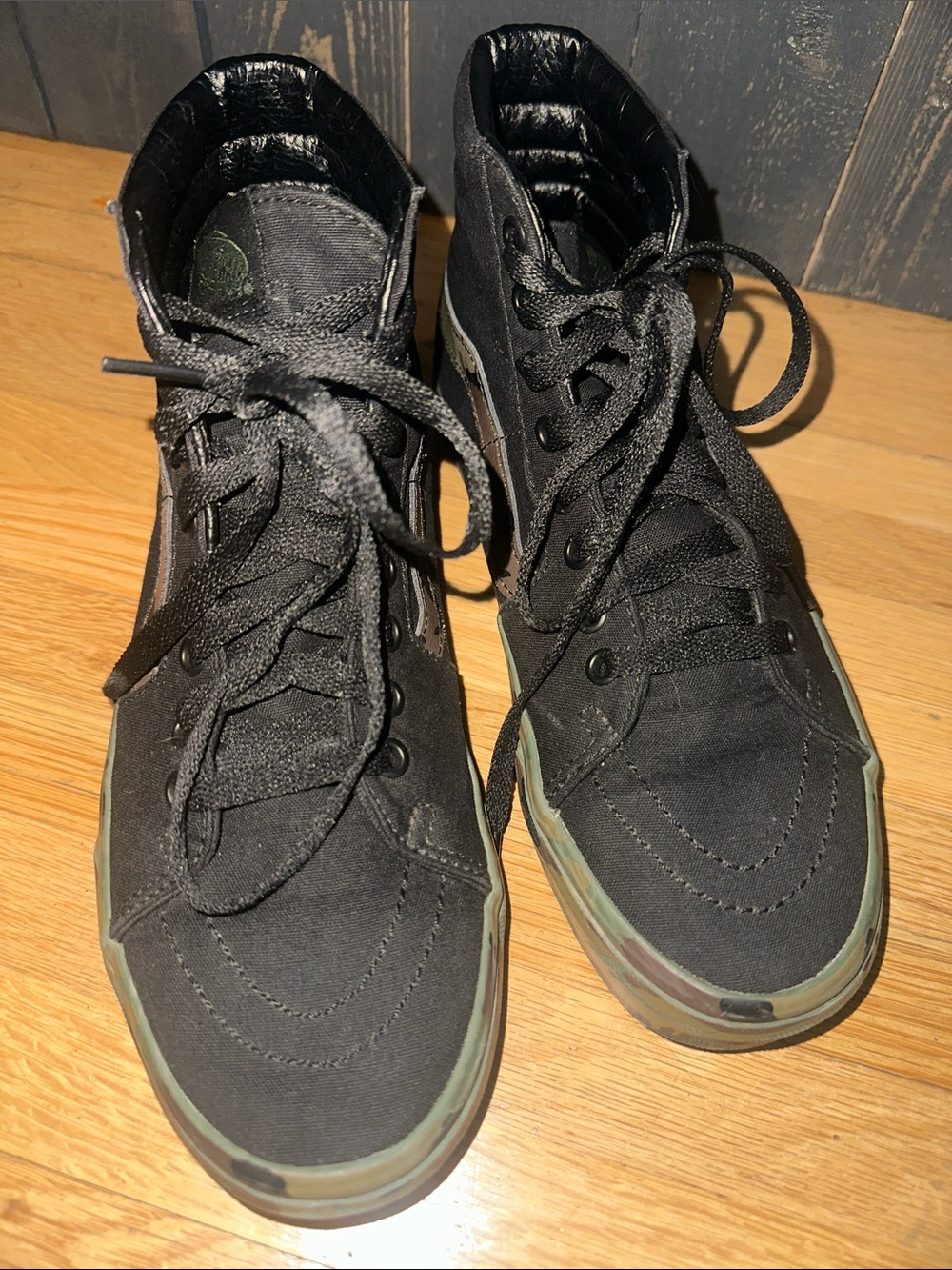 🛹 Vans Camo High-Top Sneakers with Camouflage Sole and Black leather Upper.